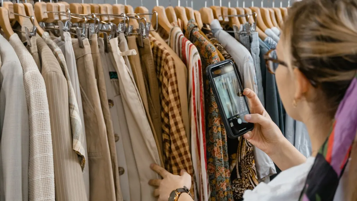Seller photographing clothes on a rack with a smartphone for a Vinted listing